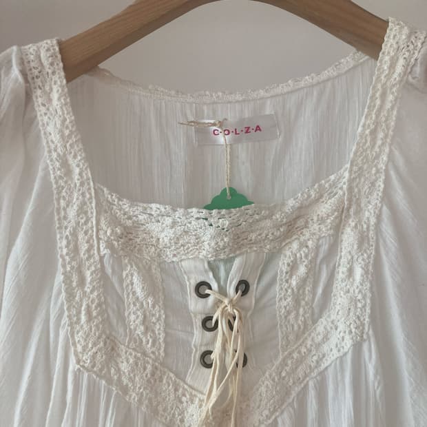 white poncho bl