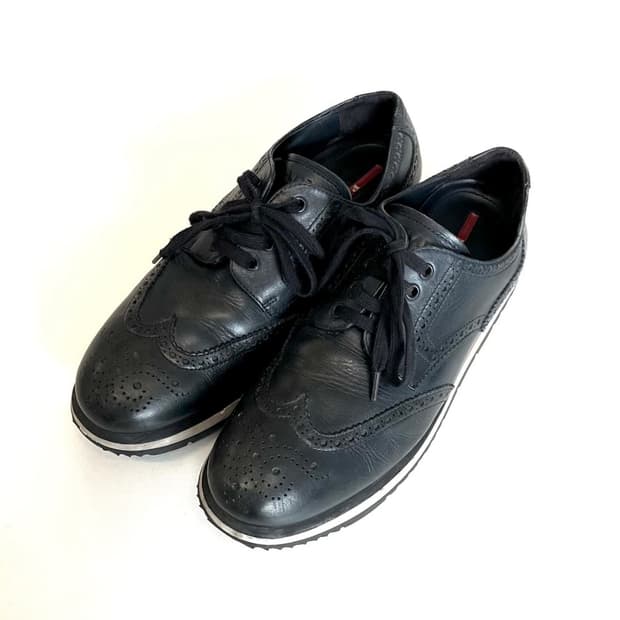 프라다 윙팁 스니커즈