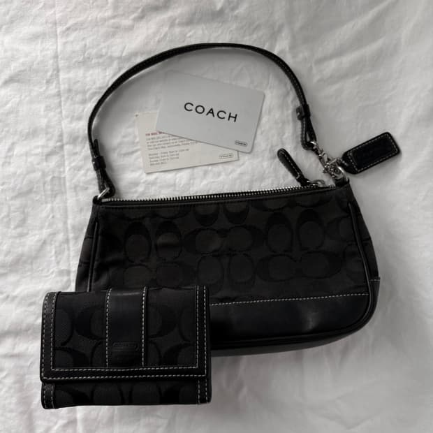 Coach black mini hand bag