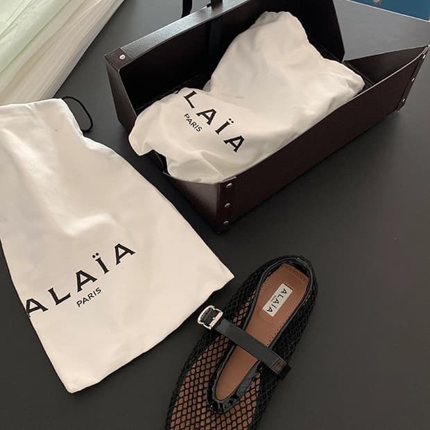 "ALAIA" BALLET FLATS IN FISHNET
