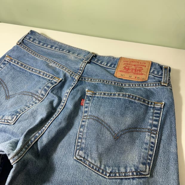 L 리바이스521 루즈 레귤러핏 연청워시드 데님팬츠