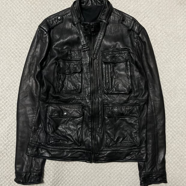 웨스턴 무드 이테리 램스킨 양가죽 절개 포켓 레더 자켓