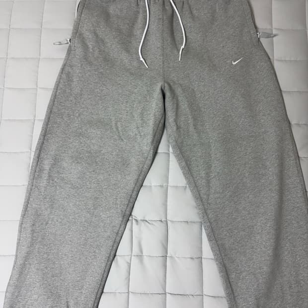 스포츠웨어 스우시 오픈 헴 플리스 팬츠