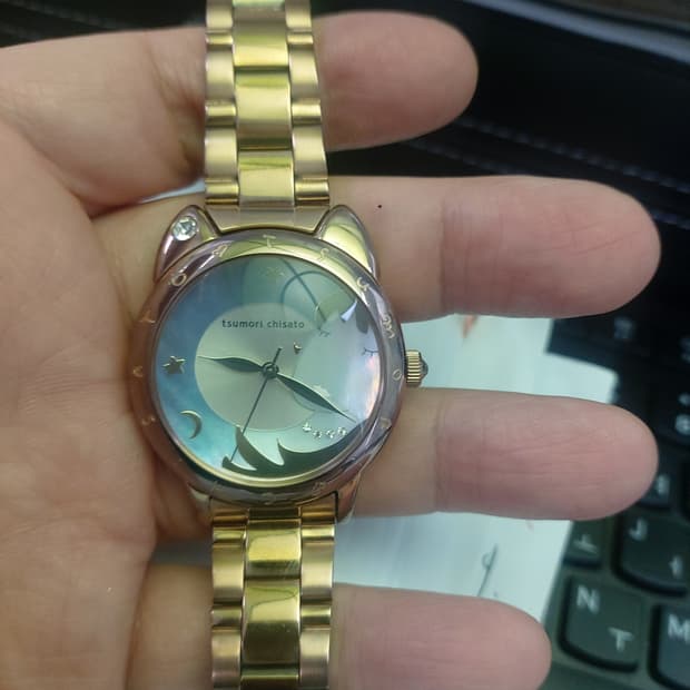 츠모리치사토의 매력적인 고양이 디자인 시계