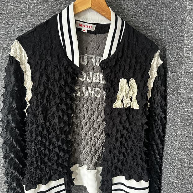 masu 팝콘 바시티 자켓 48