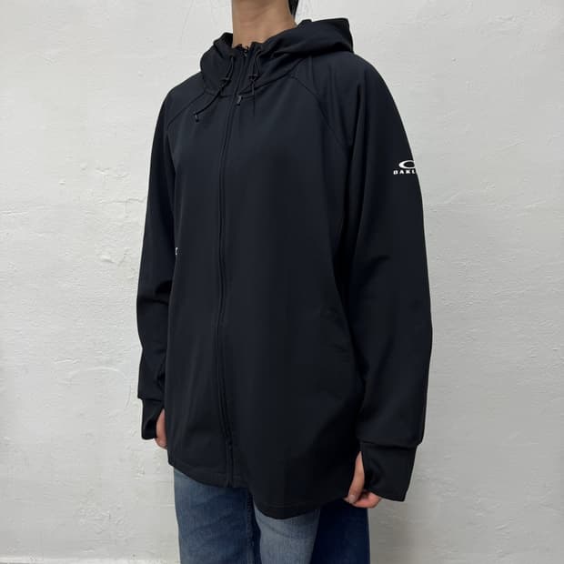 오클리(OAKLEY) 블랙컬러 인핸스 그리드 폴리에스터 후드 윈드브레이커