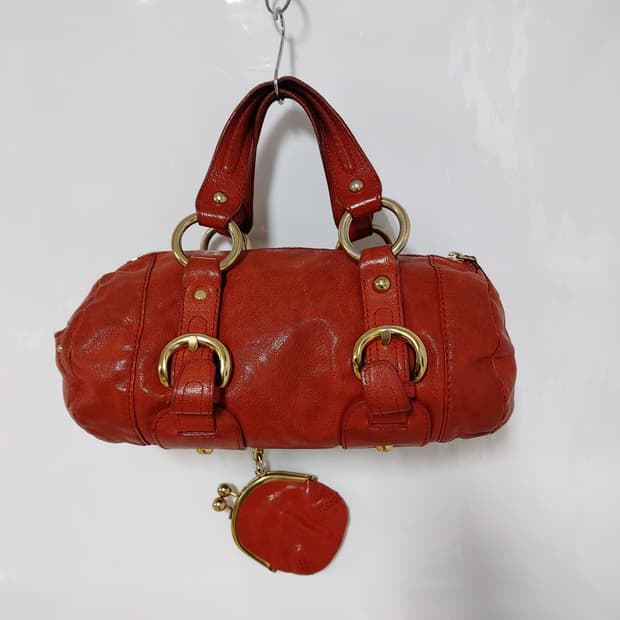 루즈 앤 라운지 여성 소면가죽 원형 토트백