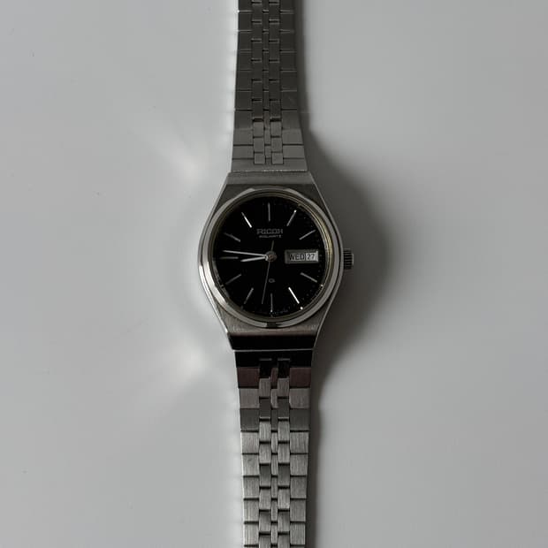 리코 1980년대 블랙 다이얼 실버 오벌 쿼츠 여성