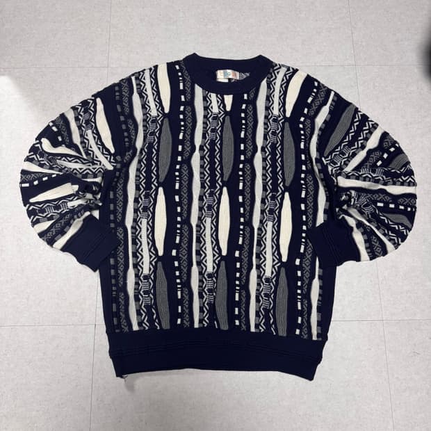 COGGI 쿠지 케이블 니트