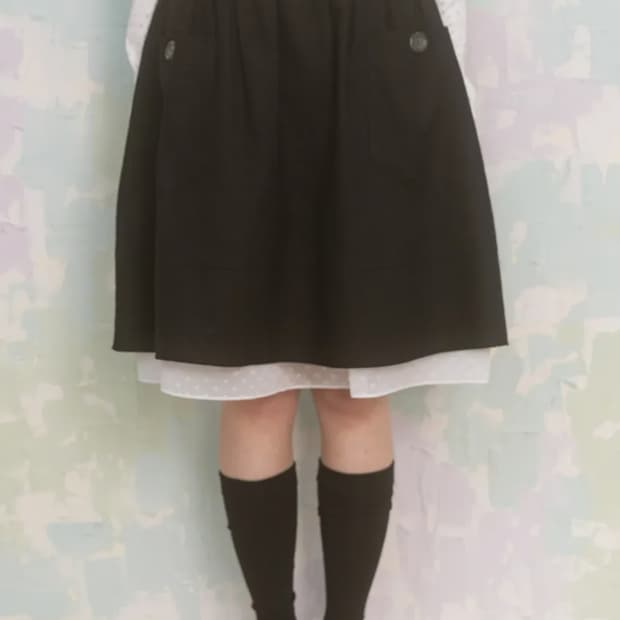 나이엔 빅 포켓 미디스커트 블랙