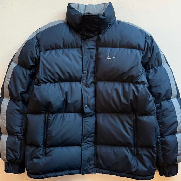 다운 함량 나이키 스우시 트랙 자켓