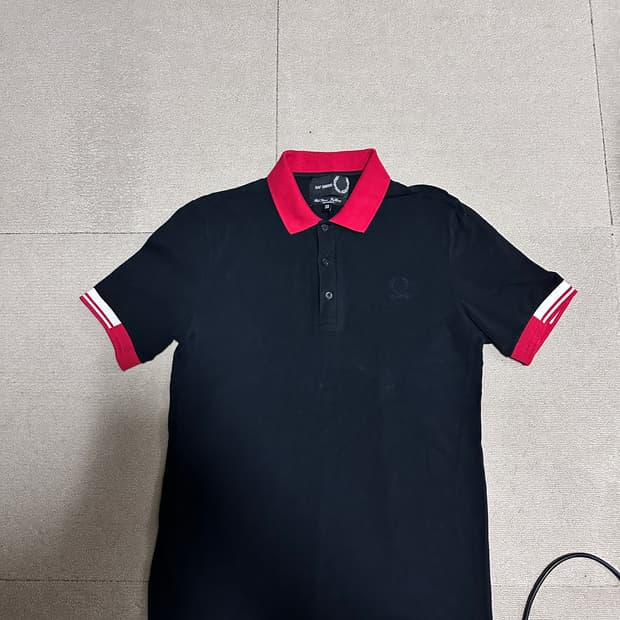 라프시몬스x프레드페리 카라티