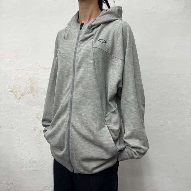 오클리 멜란지컬러 폴리에스터 혼방 테크 서클로고 구버전 후드 집업 자켓