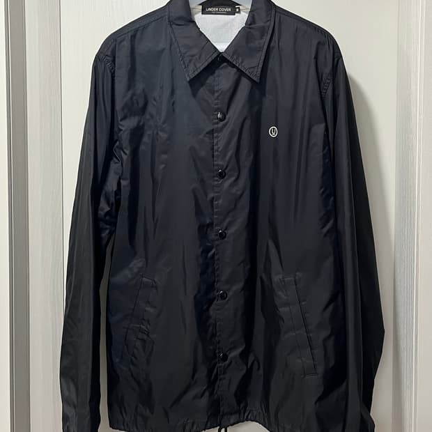 언더커버 코치자켓