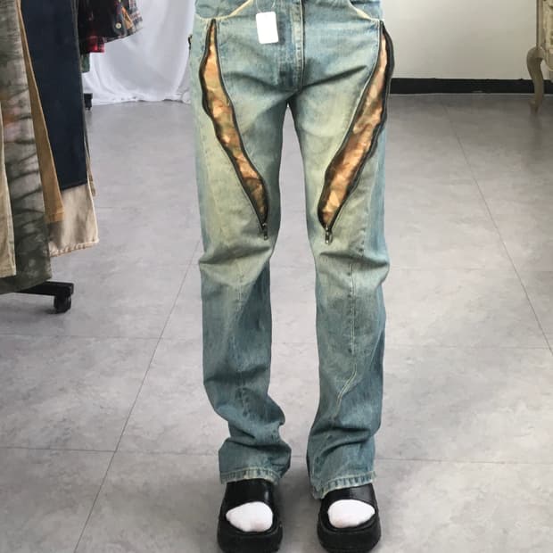 Zipper point denim pants