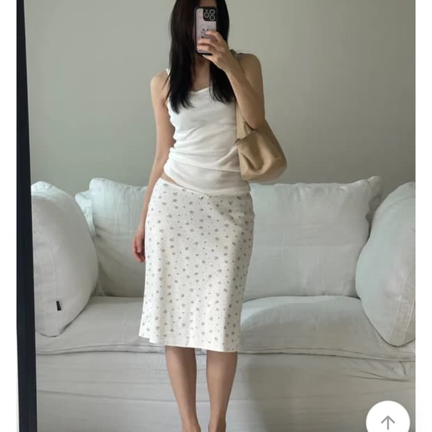 세레즈 에든 펀칭 꽃무늬 미디스커트