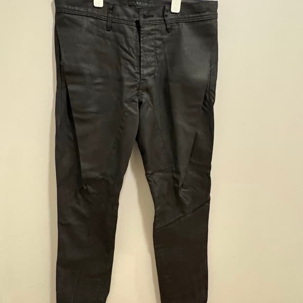 Julius dissection wax coated pants