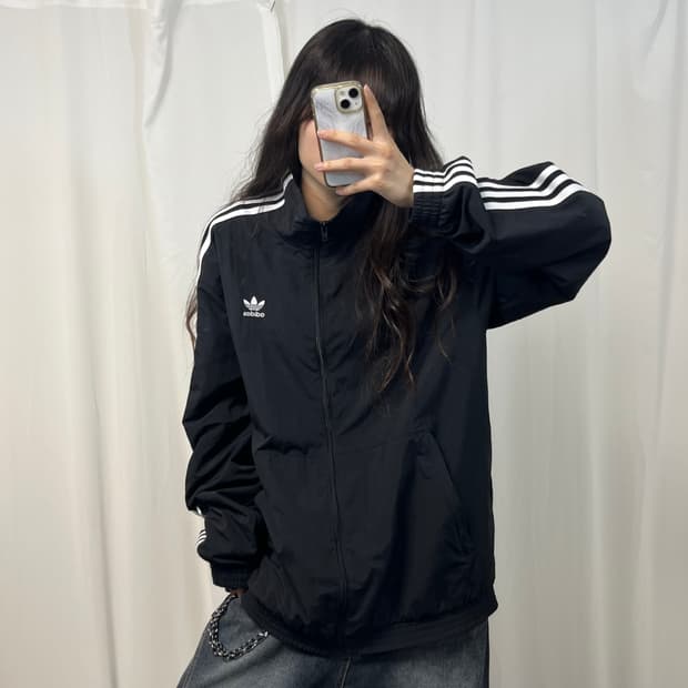 Adidas black locked up windbreak jacket
