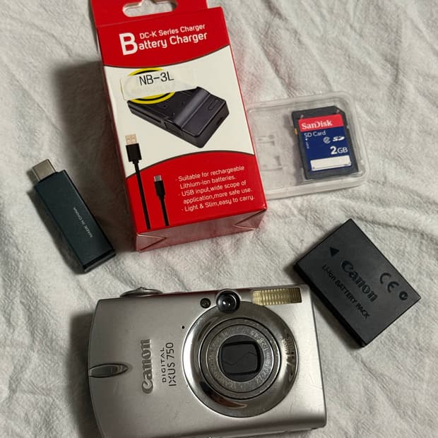캐논 익서스750 ixus750 아일릿 원희 디카 ixy700