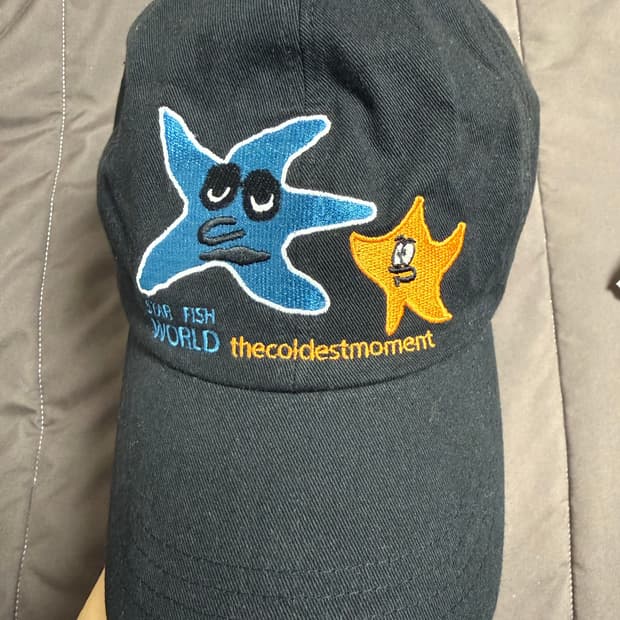 더콜디스트모먼트 모자