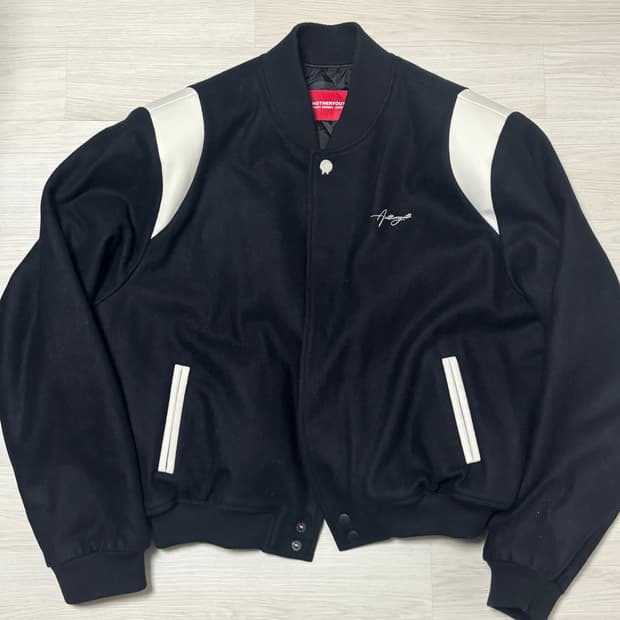 어나더유스 버튼 바시티 자켓