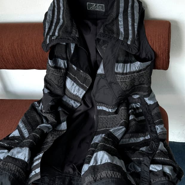 Panel design over silhouette design vest