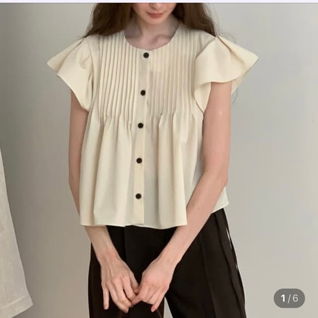 앤유브라운 뮤던블라우스 크림색