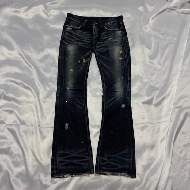 Fuga pierced distressed boots cut denim