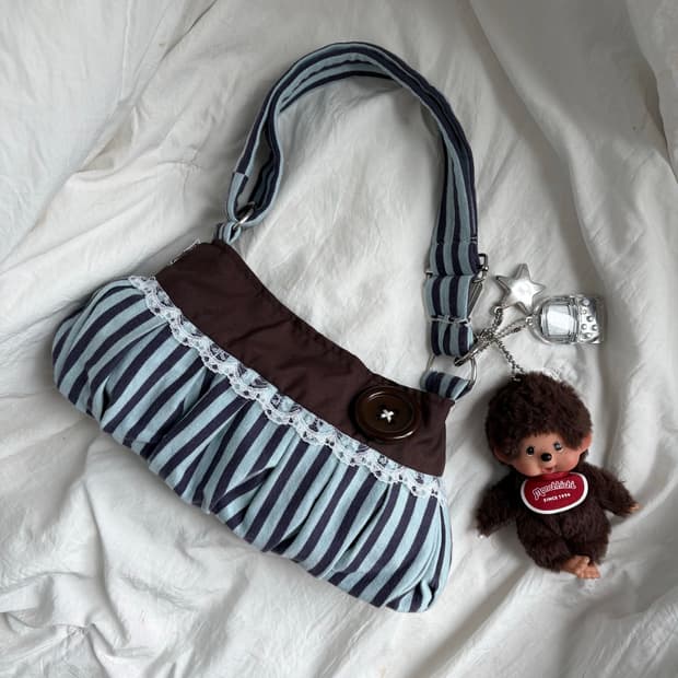 Coraline button shoulder bag