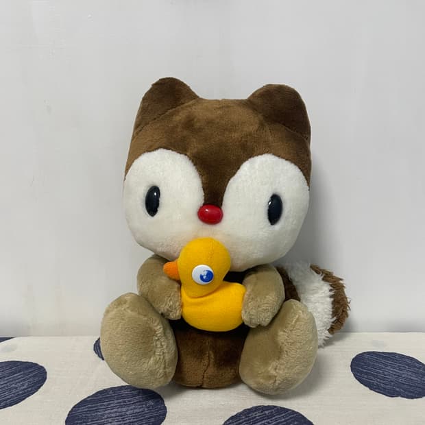 오리 들고 있는 란도리 인형