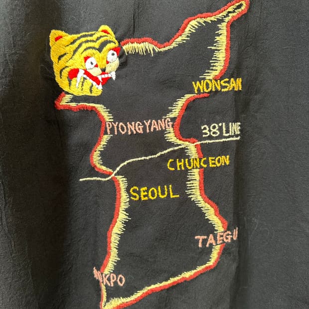 Hand embroidered open collar shirt