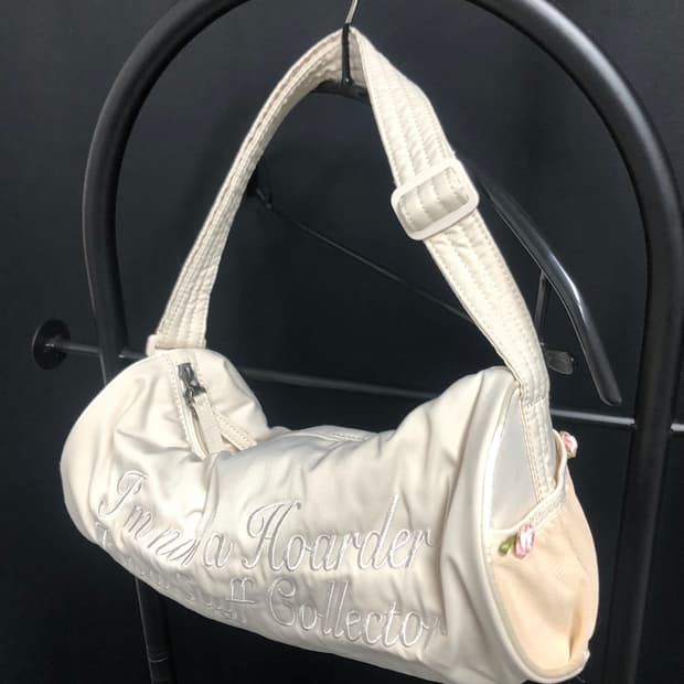 스컬프터 로즈 미니 더플백 아이보리