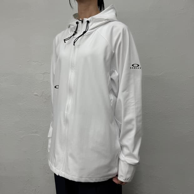 오클리(OAKLEY) 화이트컬러 인핸스 그리드 폴리에스터 혼방 후드 윈드