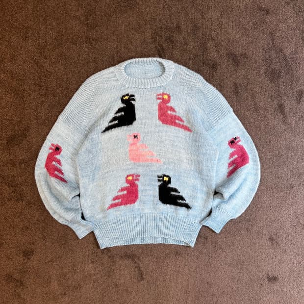 새 모티브 니트 스웨터