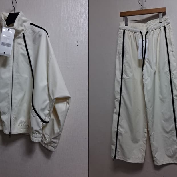 아이보리 배색 파이핑 디테일의 테크 트랙 셋업, 바스락 세미광 원단 