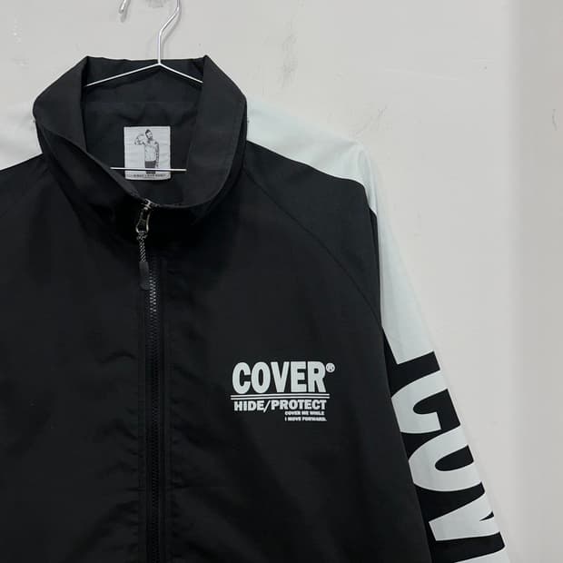 인터매니아 래글런 오버핏 나일론 코치자켓