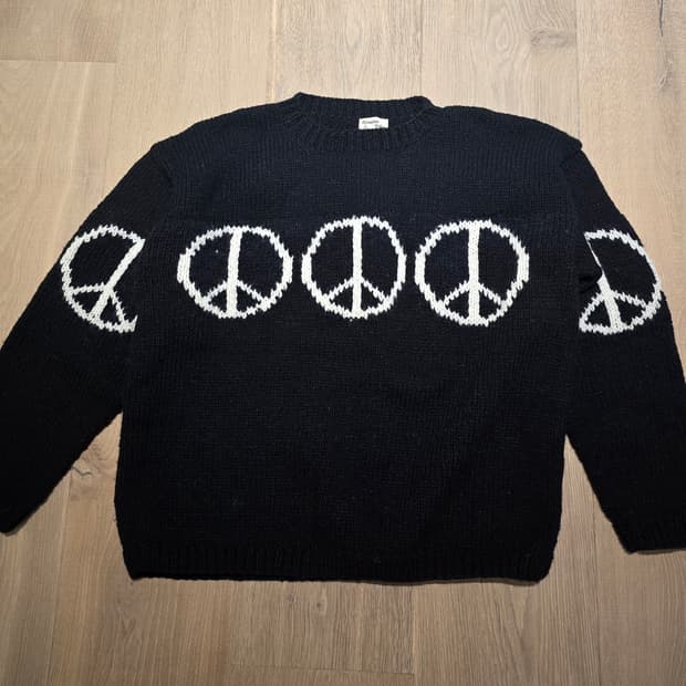 Mcmachon Woolen 블랙 울 니트입니다. 