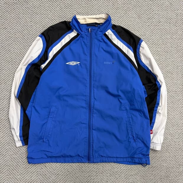 엄브로 배색 로고 바람막이 v1841