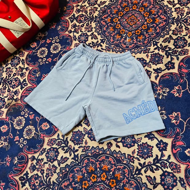 아크메드라비 사이드 레터링 코튼 숏츠 반바지