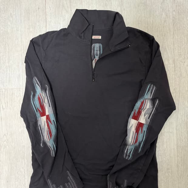 캐피탈 오르테가 저지 하프 집 롱슬리브 티셔츠 차콜