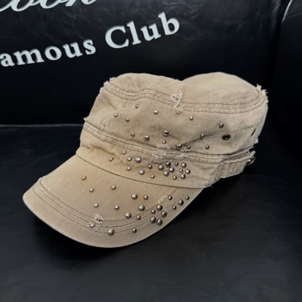 00s stud damaged cap