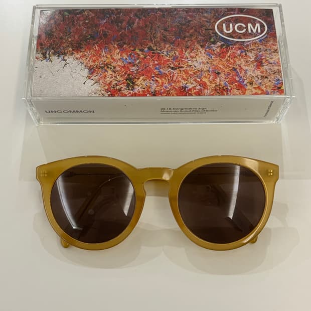 언커먼아이웨어 DIRECTION AMBER SUN