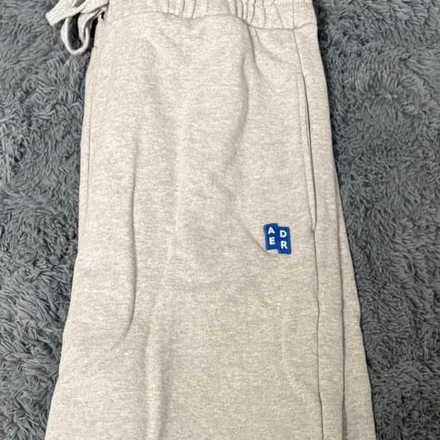 (XL) 아더에러 시그니피컨트 TRS 태그 스웨트팬츠 01 그레이