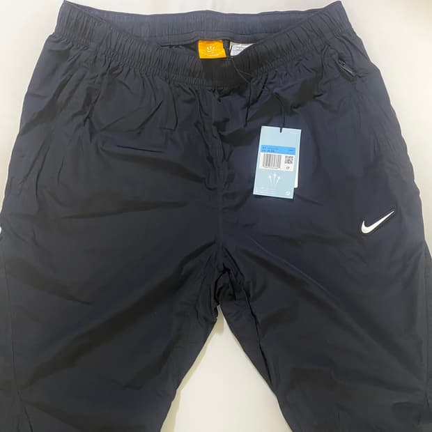 나이키x드레이크 녹타 우븐 트랙 팬츠 블랙(FN7668-010) M사이즈