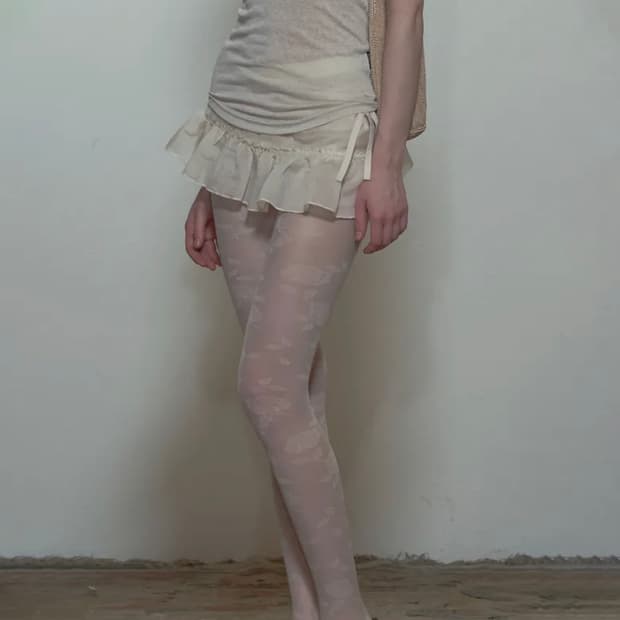 스컬프터 피카부 마이크로 스커트 로우 아이보리