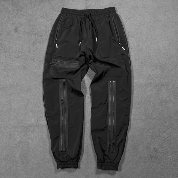 99%is 지퍼 디테일 나일론 조거 팬츠