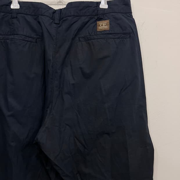 CP컴퍼니 와이드핏 포켓 나일론 트랙팬츠