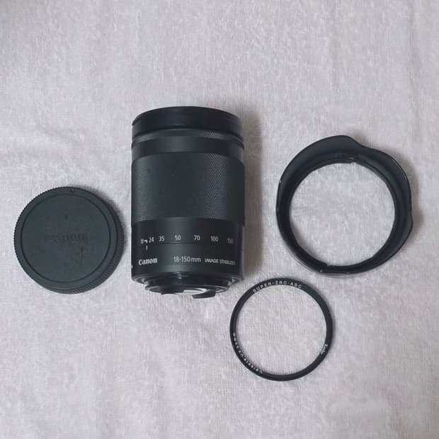 캐논 EF-M 18-150mm F3.5-6.3 IS STM 렌즈 팝니다.