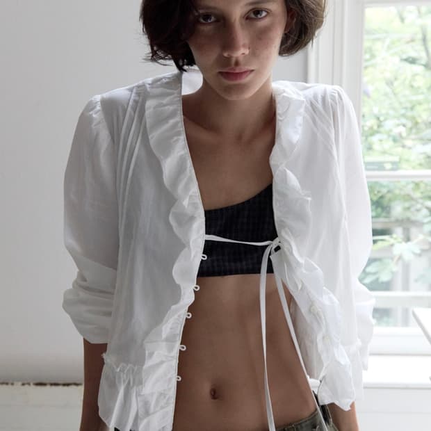 포에토 Smudge frill blouse