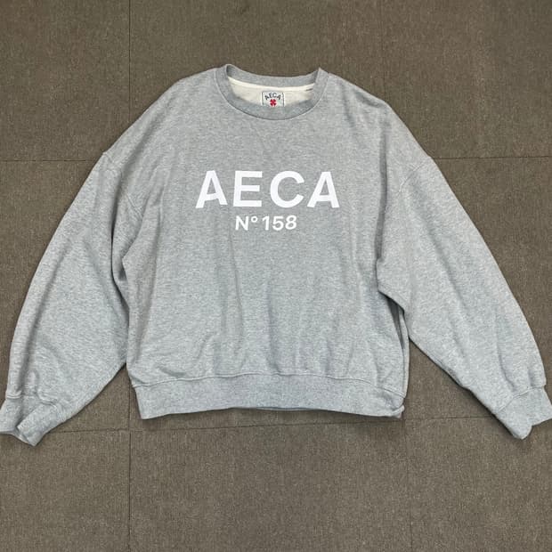 AECA WHITE 에이카 스펠아웃 맨투맨 L